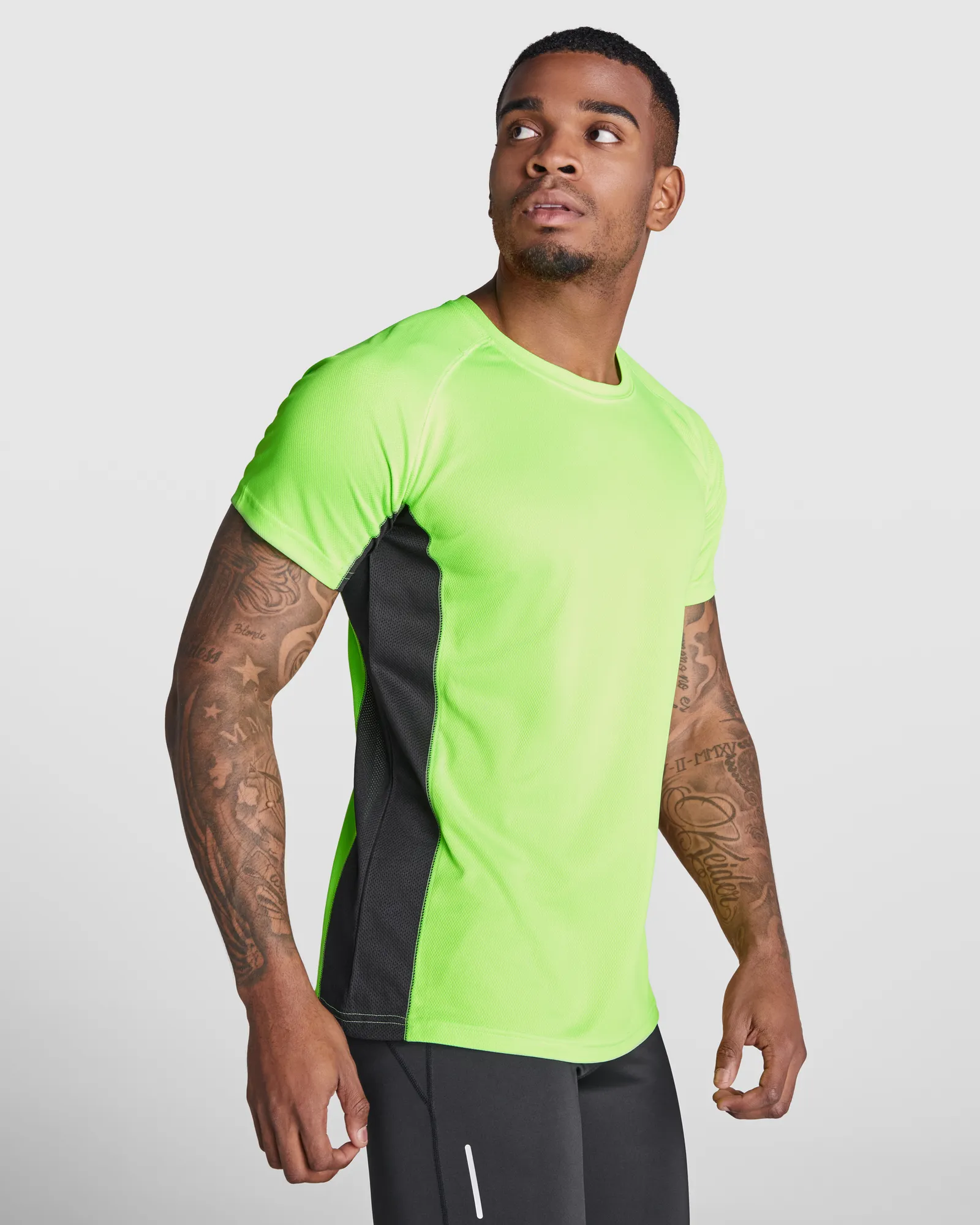 T-shirt tecnica Roly Shanghai, Verde Fluoro/Nero