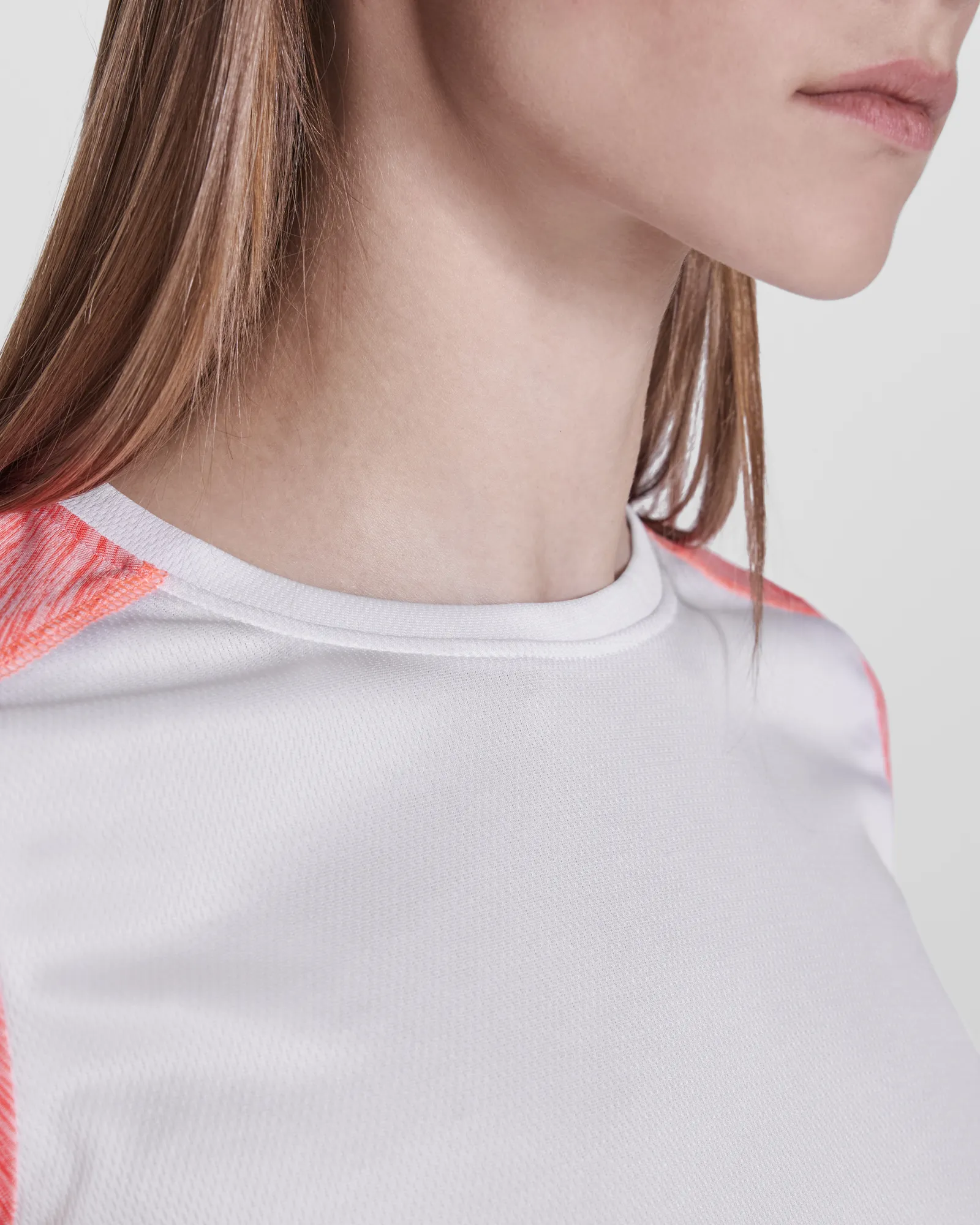 T-shirt tecnica Roly Zolder Woman, Bianco/Corallo Fluo Vigorè, dettaglio 4